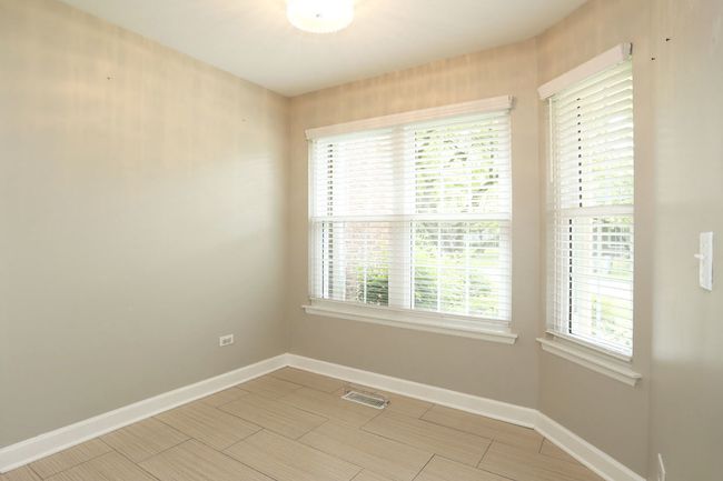 PLEASANT SUN FILLED KITCHEN DINING AREA | Image 12