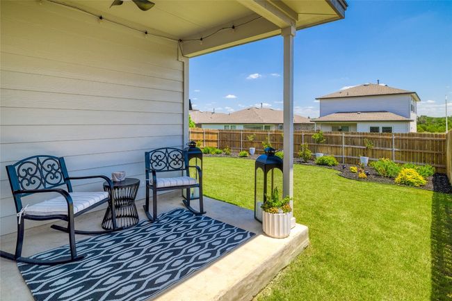 View of patio with a ceiling fan | Image 24