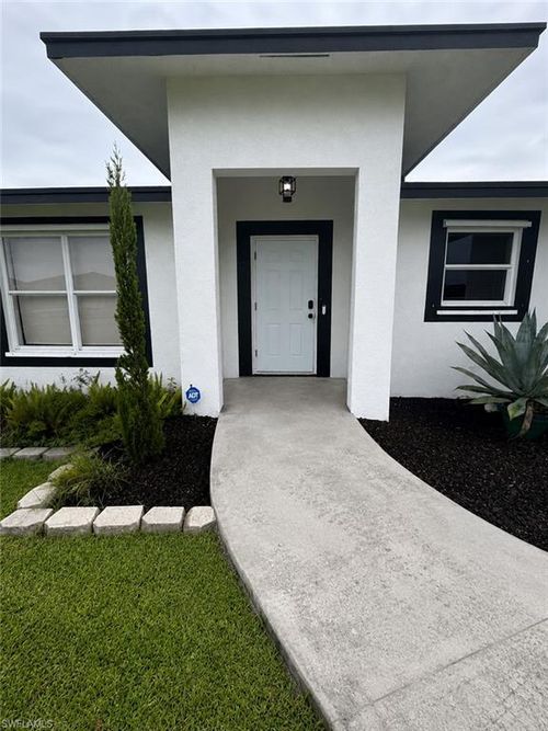 157 Dabou Loop, Belle Glade, FL, 33430-4284 | Card Image