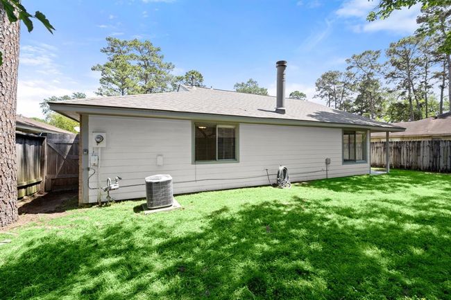 Step outside to a large yard | Image 31