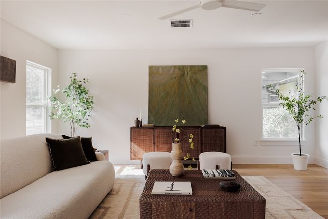 Living area with light wood-style flooring and a ceiling fan | Image 17