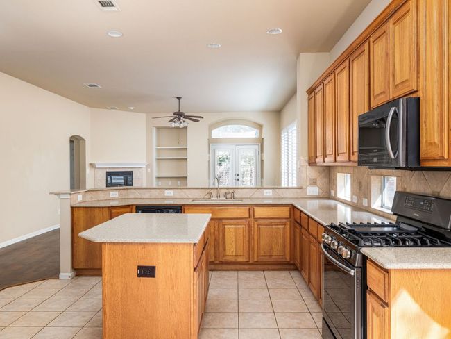 The open kitchen is suited for big meals and entertaining. | Image 7