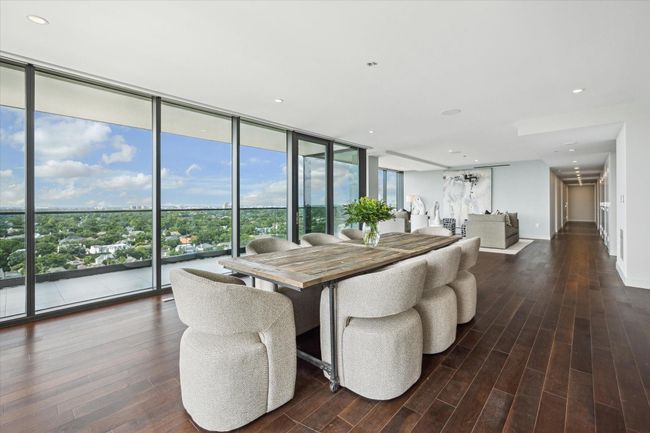 The River Oaks neighborhood to the north provides the formal dining and living room with endless views of green space and lush trees. | Image 7