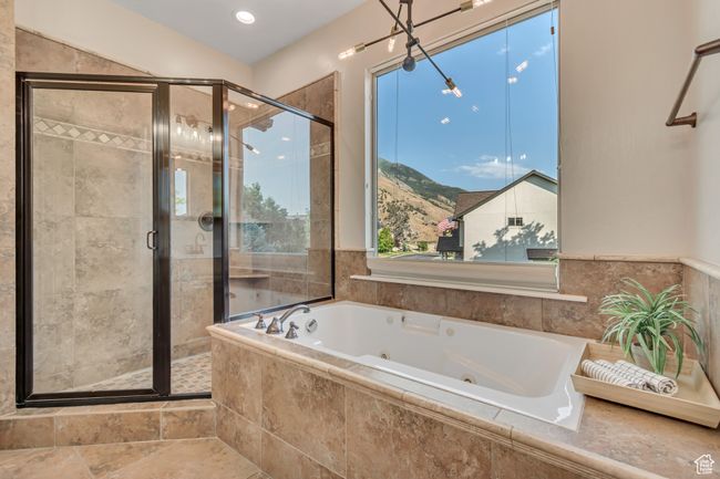 Full bath with a whirlpool tub and a shower stall | Image 18