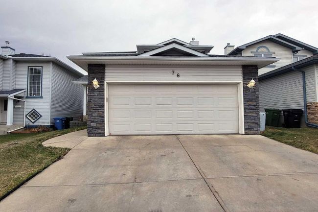 78 Tuscarora Close Nw, Home with 4 bedrooms, 3 bathrooms and 4 parking in Calgary AB | Image 2
