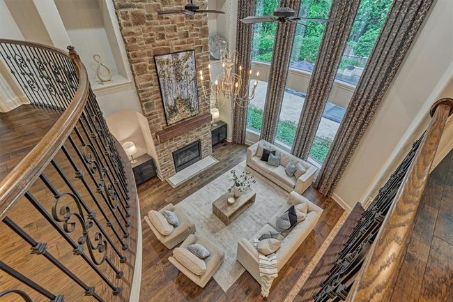 Upstairs looking over into the family room. | Image 15