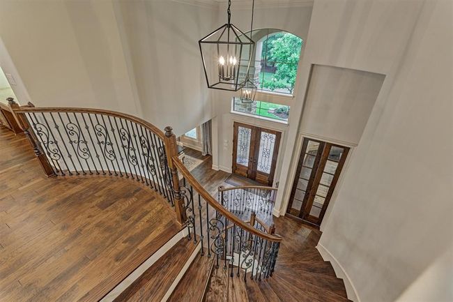 Upstairs looking down to the entryway. | Image 14