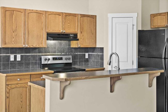 156 Rockyspring Grove Nw, Townhouse with 3 bedrooms, 3 bathrooms and 2 parking in Calgary AB | Image 6