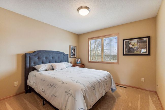 Bedroom 2 with custom blinds. | Image 16