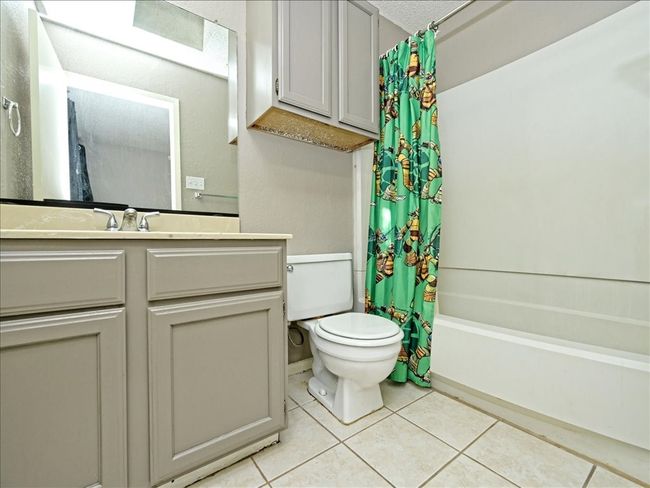Not actual unit, similar layout. Bedroom 2 in suite full bath. | Image 13