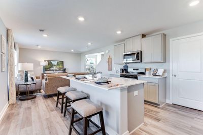 Another view of the Kitchen. Photo of model home, color & options will vary. | Image 2