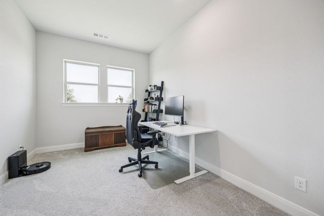 Office space featuring carpet and baseboards | Image 13