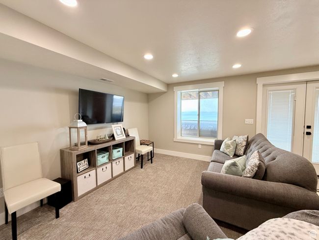 Living area featuring visible vents, recessed lighting, french doors, and carpet | Image 37