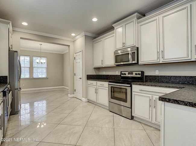 9610 Abby Glen Cir, Home with 4 bedrooms, 3 bathrooms and null parking in Jacksonville FL | Image 13