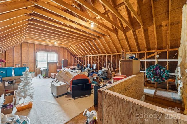 Un finished Attic off the Bonus Room Second floor...stairs to the right leading to the kitchen downstairs | Image 24