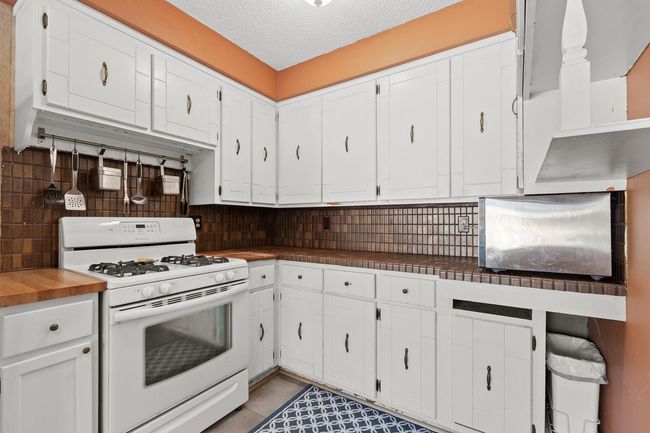 11212 W River Road, House other with 4 bedrooms, 3 bathrooms and null parking in Champlin MN | Image 21