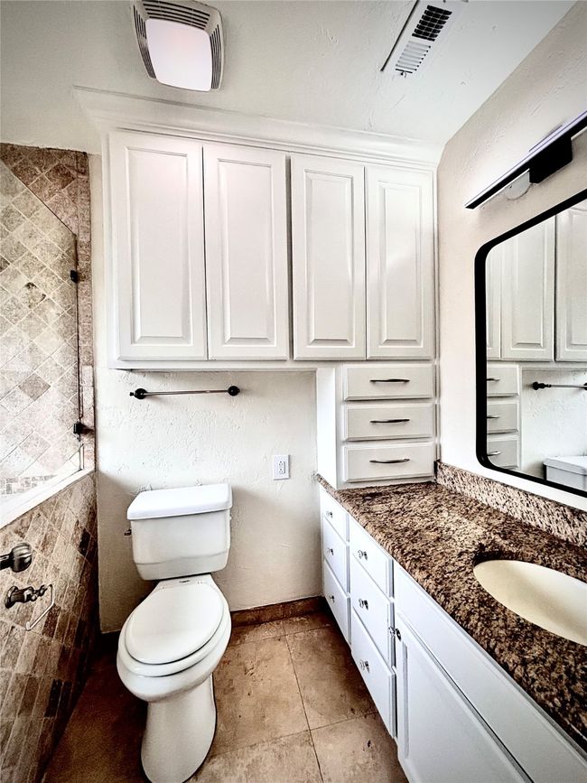 Bathroom with vanity, extra storage and toilet | Image 21