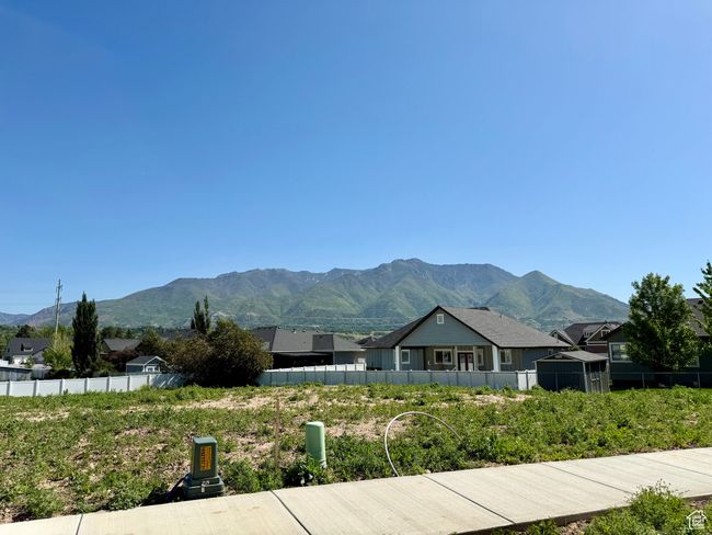 View of mountain background featuring nearby suburban area | Image 22
