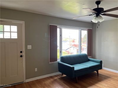 Entryway with hardwood / wood-style flooring and ceiling fan | Image 3