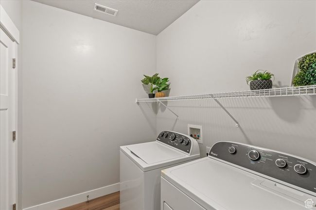 Spacious laundry room with extra closet for storage! | Image 22