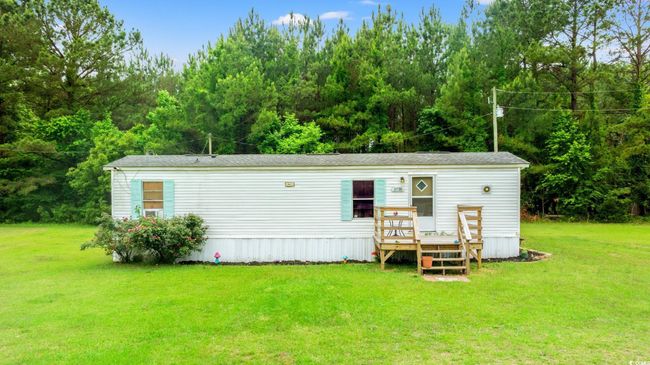 View of front of property with a front lawn | Image 25