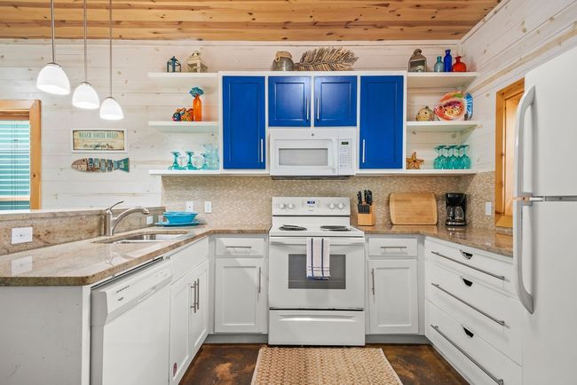 Kitchen with lots of cabinet space, pocket window and pantry! | Image 8