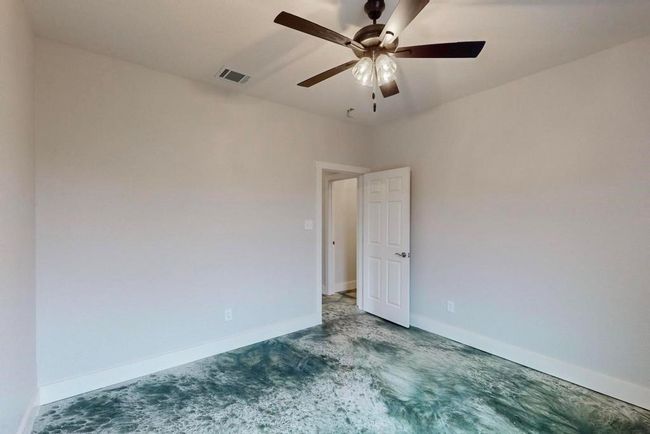 Unfurnished room featuring visible vents, baseboards, a ceiling fan, and carpet flooring | Image 13