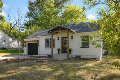 View of front of property with a garage and a front yard | Image 3