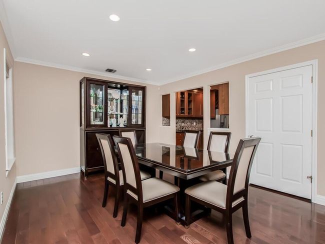 Spacious Dining Room. Crown molding. | Image 4