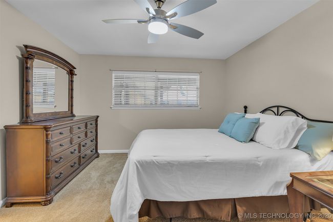 Primary bedroom with room for a large dresser | Image 11