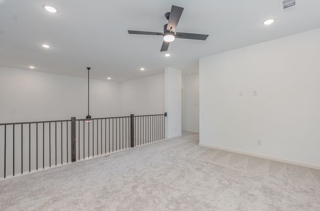 Carpeted spare room with ceiling fan and recessed lighting | Image 19
