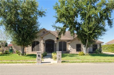 View of front of house with a front yard | Image 1