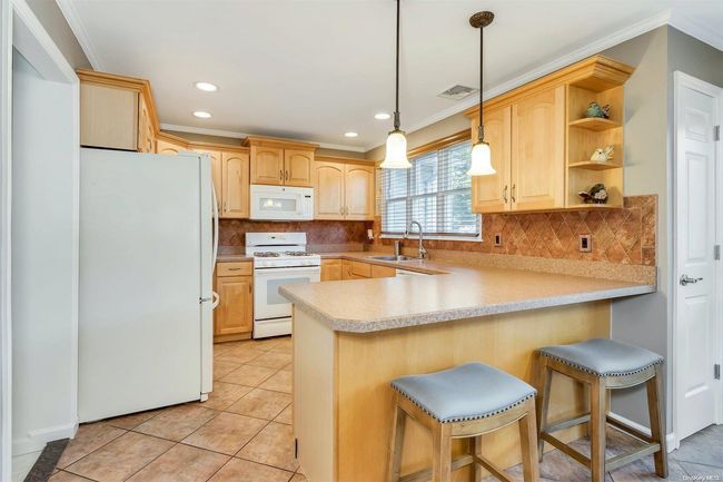 136 Mccarthy Ln, House other with 3 bedrooms, 2 bathrooms and null parking in Great River NY | Image 10