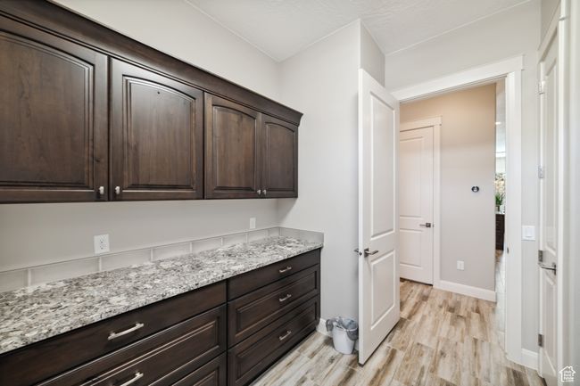 Interior space featuring baseboards and light wood-style floors | Image 25