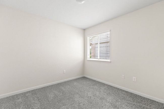 Carpeted spare room featuring baseboards | Image 15