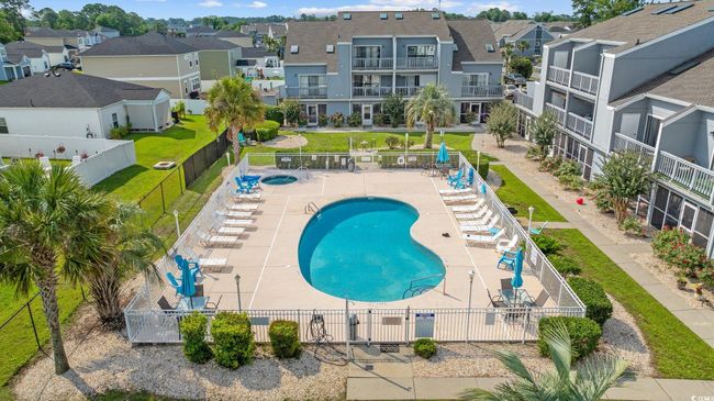 Community pool featuring a residential view | Image 24
