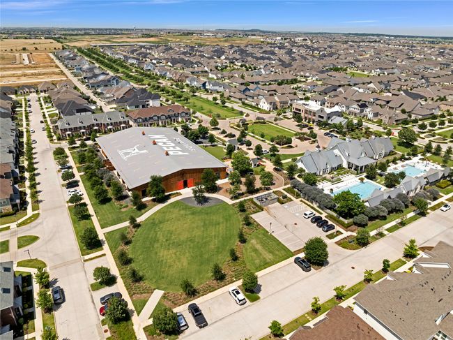 Aerial view of Arena, Pioneer Park and common areas, featuring a two community pools | Image 36