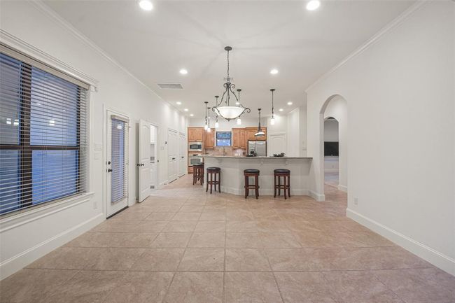 Another view of the dining room from the living room. | Image 17