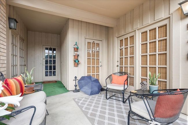 Back patio shared with neighbor. | Image 18