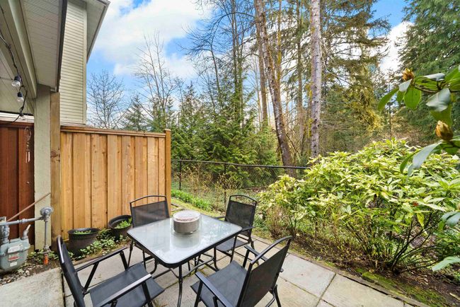View of patio featuring outdoor dining area and fence | Image 32