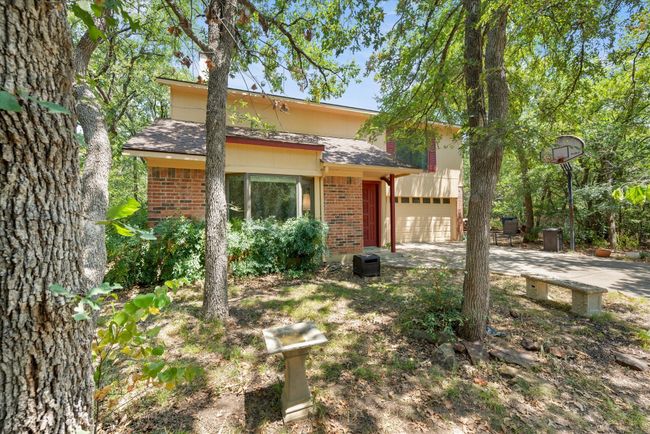 View of front of property with a garage | Image 13