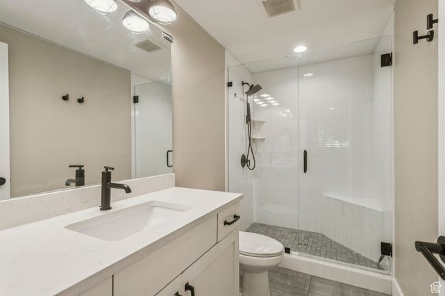 Bathroom featuring vanity, a shower stall, and recessed lighting | Image 61