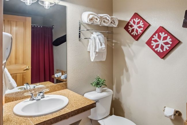 Oversized bathroom with bathtub and shower. | Image 8