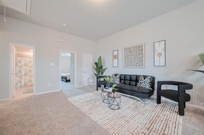 This is spacious upstairs game room. | Image 32