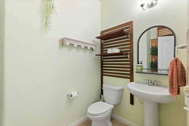 Half bathroom located on the main floor of the home. | Image 13