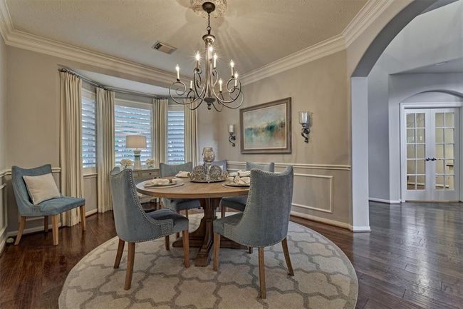 Formal Dining room with front facing windows. Great for entertaining guests or sharing a holiday with family. | Image 14