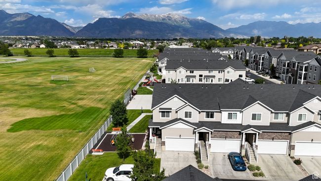 Aerial view of residential area featuring a mountain backdrop | Image 35