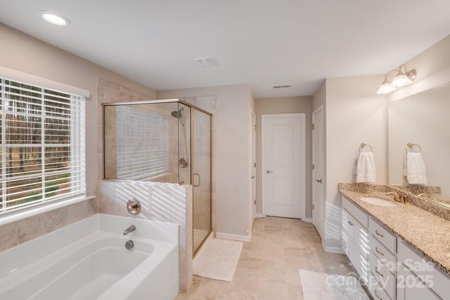 Spacious Owners Bath with natural light abounding | Image 26