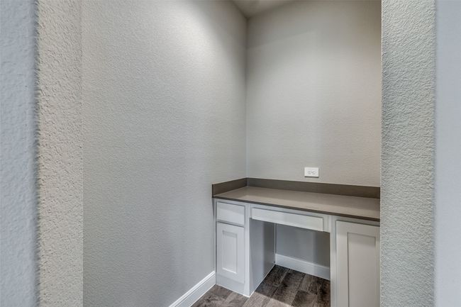 Unfurnished office featuring dark wood-type flooring | Image 22