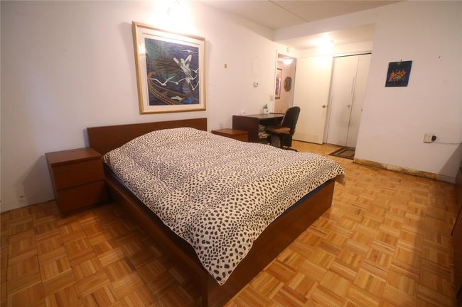 Bedroom with a closet and baseboards | Image 20